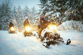 snowmobiling in northern Michigan winter scene